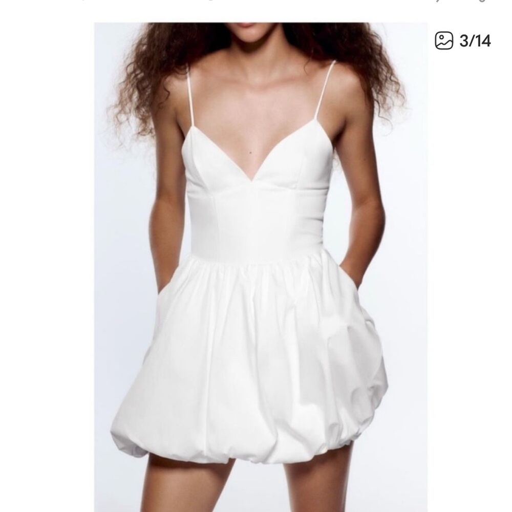 White romper that is the appearance of a dress! Never been worn!